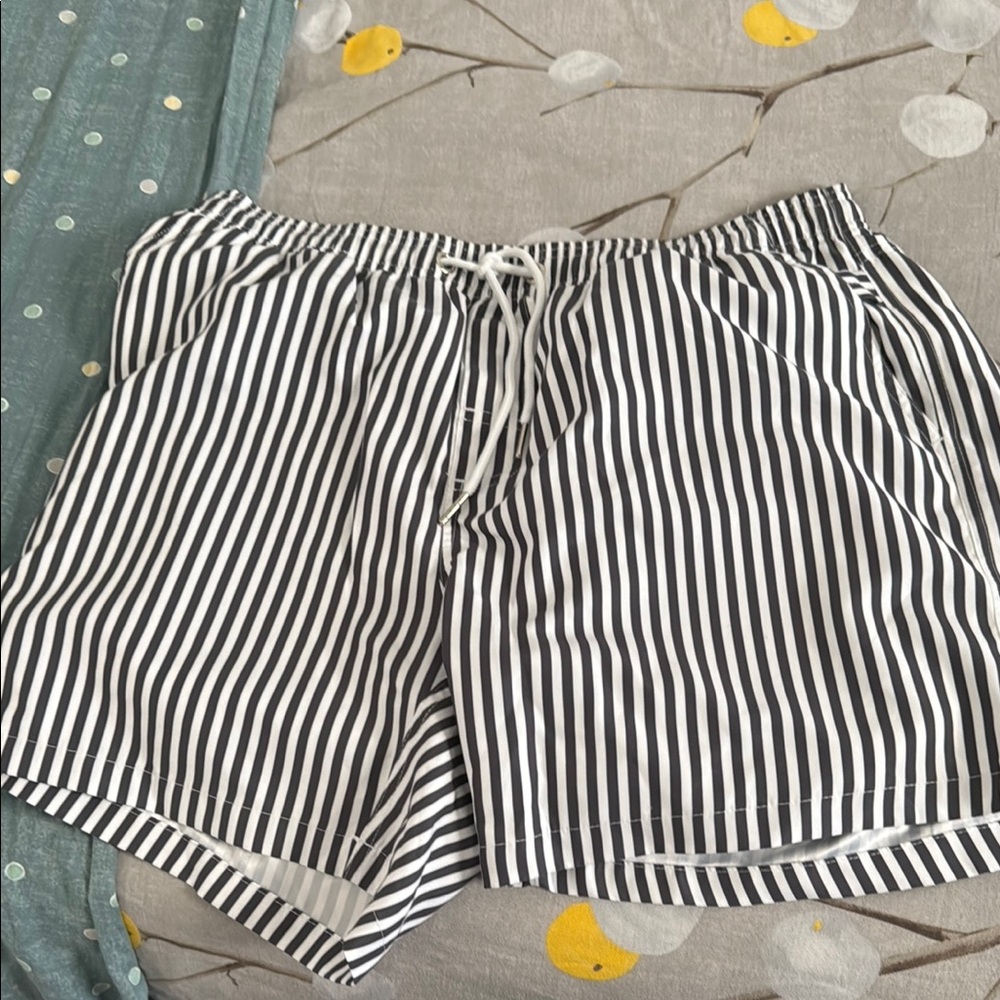 Black and White Athletic Shorts with Vertical Stripes